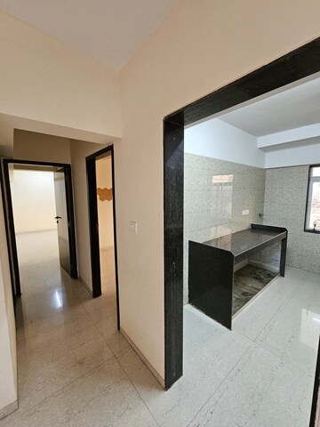 Building Lobby in 2 BHK Apartment at Millionaire Heritage, Andheri West – for Rent