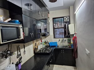 Kitchen in 3 BHK Builder Floor at Umang Winter Hills Dwarka Mor, Dwarka Mor – for Sale