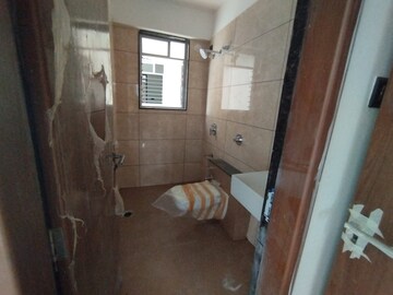 Bathroom in 2 BHK Apartment at Kohinoor Riverdale, Kharadi – for Sale