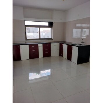 Kitchen in 2 BHK Apartment at Paranjape Blue Ridge, Hinjewadi – for Rent