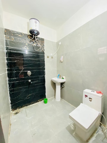 Bathroom in 1.5 BHK Apartment at Sunny Enclave – for Rent