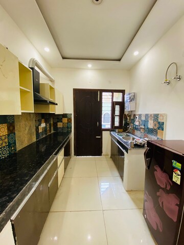 Kitchen in 1.5 BHK Apartment at Sunny Enclave – for Rent