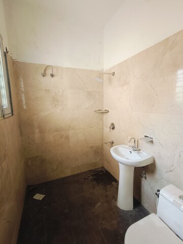 Bathroom in 1.5 BHK Apartment at Sunny Enclave – for Rent