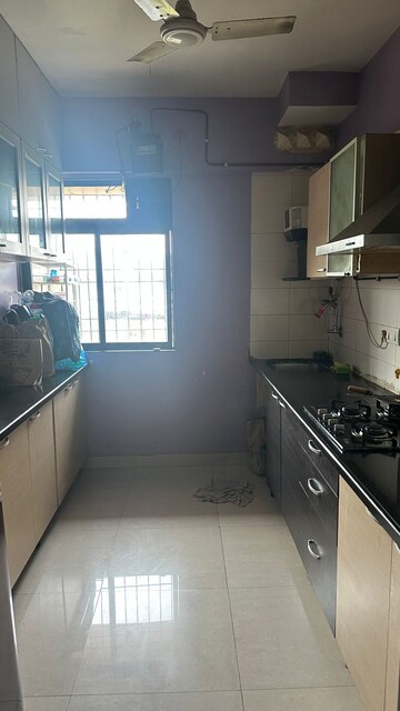 Kitchen in 2 BHK Apartment at Devashree Park, Kolshet Road – for Sale