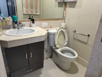 Bathroom in 3 BHK Apartment at Hiranandani Meadows, Manpada – for Rent