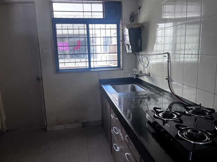 Kitchen, magarpatta-city-cosmos 3 Bedroom 1600 Sq.Ft. Apartment In Magarpatta Road Pune 8684770