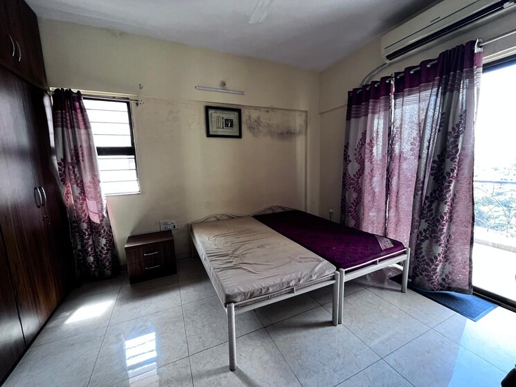 Bedroom, magarpatta-city-cosmos 3 Bedroom 1600 Sq.Ft. Apartment In Magarpatta Road Pune 8684770