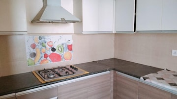 Kitchen in 3.5 BHK Apartment at Godrej Aria, Sector 79 – for Rent