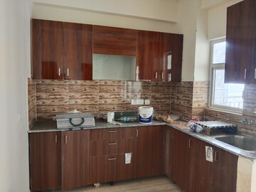 Kitchen in 2.5 BHK Apartment at Amrapali Terrace Homes, Tech Zone 4 Greater Noida – for Rent