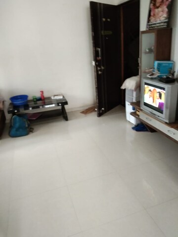 Living Room in 1 BHK Apartment at Vanaz Corner, Kothrud – for Rent