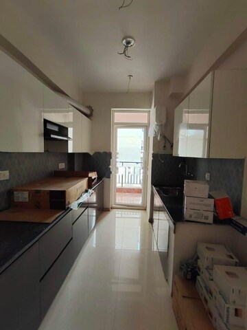 Kitchen in 3 BHK Apartment at Pareena The Elite Residences, Sector 99 – for Rent