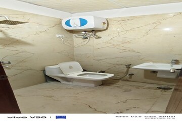 Bathroom in 3 BHK Builder Floor at Shakti Khand Iii – for Rent