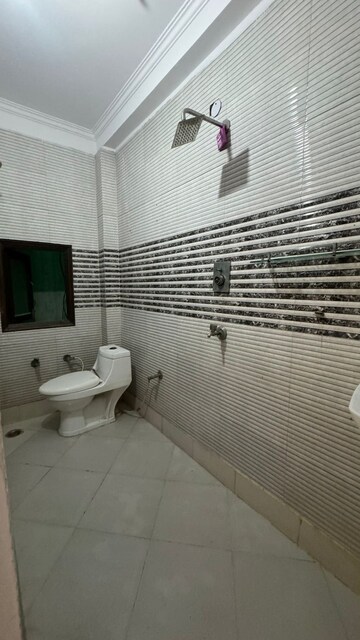 Bathroom in 2 BHK Apartment at Mohan Garden – for Rent