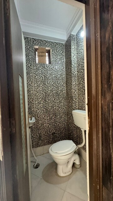 Bathroom in 2 BHK Apartment at Mohan Garden – for Rent