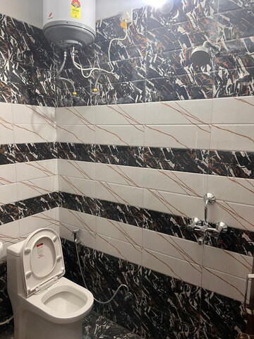 Attached Bathroom in 4 BHK Apartment at East Of Kailash – for Sale