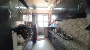 Kitchen in 3 BHK Apartment at Sahaj Solarium, Vasna – for Rent