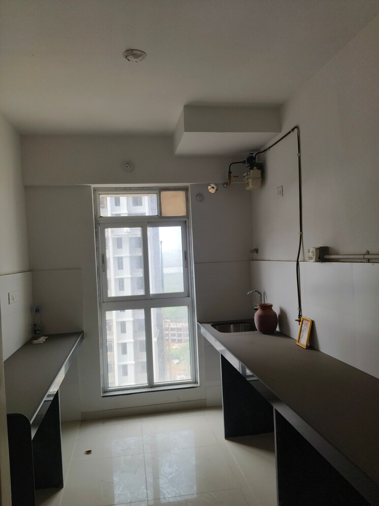 Kitchen, godrej-emerald 2 Bedroom 750 Sq.Ft. Apartment In Ghodbunder Road Thane 8687501