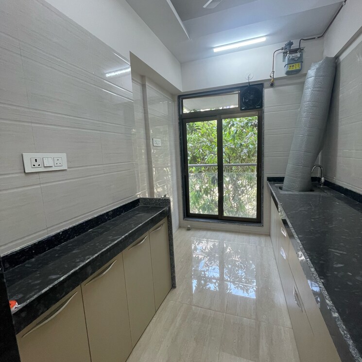Kitchen, je-and-vee-om-trimurti 1 Bedroom 395 Sq.Ft. Apartment In Dindoshi Mumbai 8687547