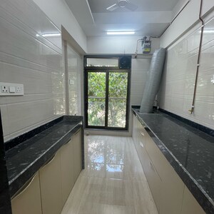 Kitchen in 1 BHK Apartment at Je And Vee Om Trimurti, Dindoshi – for Sale