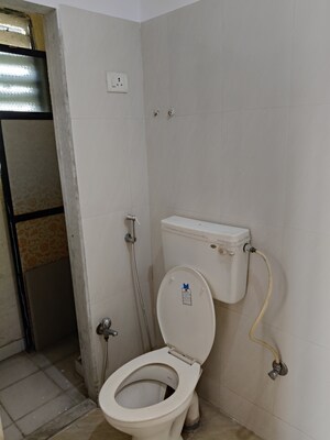 Bathroom in 2 BHK Apartment at Pushpanjali Heights, Owale – for Sale