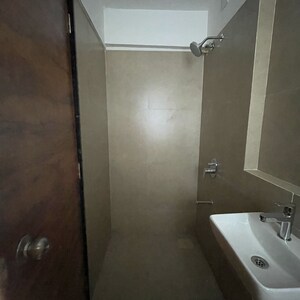 Bathroom in 1 BHK Apartment at Je And Vee Om Trimurti, Dindoshi – for Sale