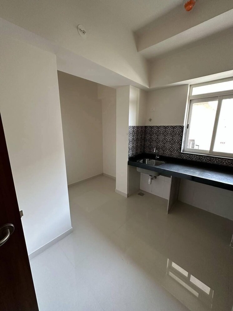 Kitchen, lodha-amara 2 Bedroom 679 Sq.Ft. Apartment In Kolshet Road Thane 8687678