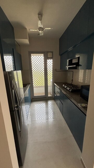Kitchen in 2 BHK Apartment at Piramal Vaikunth Vama, Balkum Pada – for Rent
