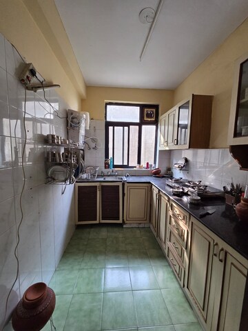 Kitchen in 3 BHK Apartment at Sector 23a – for Sale