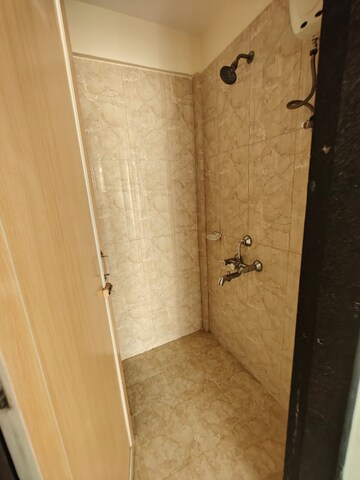 Bathroom in 1 BHK Apartment at Om Prabhu Manohar CHS, Seawoods Sector 50 – for Rent