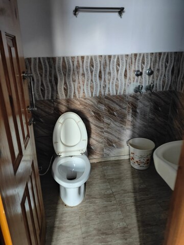 Bathroom in 3 BHK Apartment at Gardenia Golf City, Sector 75 – for Rent