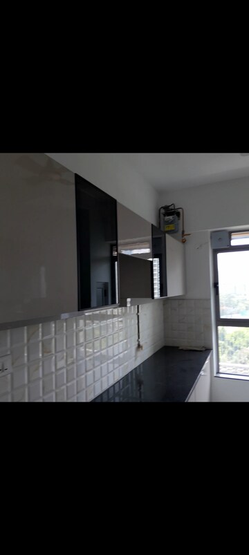 Kitchen in 2 BHK Apartment at Kalpataru Immensa, Kolshet Road – for Rent