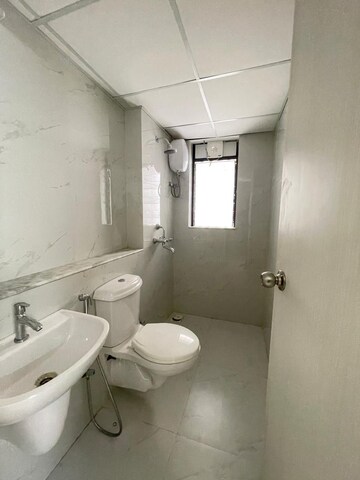 Bathroom in 1 BHK Apartment at Runwal Gardens Phase I, Dombivli East – for Rent
