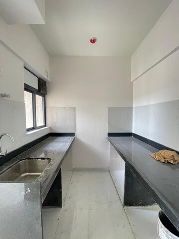 Kitchen in 1 BHK Apartment at Runwal Gardens Phase I, Dombivli East – for Rent