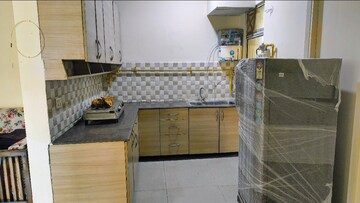 Kitchen in 2 BHK Apartment at Gaur City 2 - 11th Avenue, Sector 16c Greater Noida – for Rent