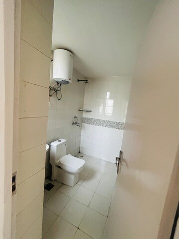 Bathroom in 2 BHK Apartment at Unitech Uniworld Gardens 2, Sector 47 – for Rent