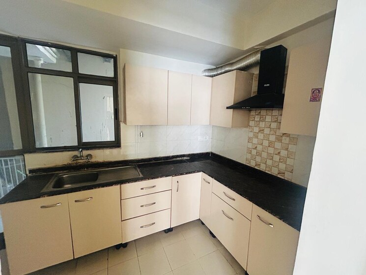 Kitchen, unitech-uniworld-gardens-2 2 Bedroom 973 Sq.Ft. Apartment In Sector 47 Gurgaon 8688370