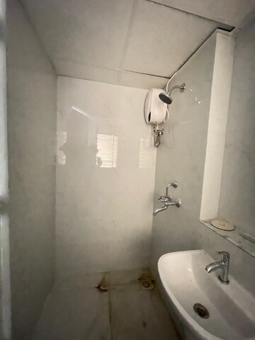 Bathroom in 1.5 BHK Apartment at Runwal Gardens, Dombivli East – for Rent