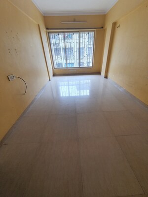 Living Room in 1 BHK Apartment at Kandivali West – for Sale