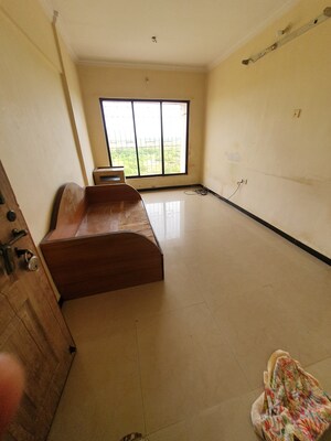 Living Room in 1 BHK Apartment at Kandivali West – for Sale