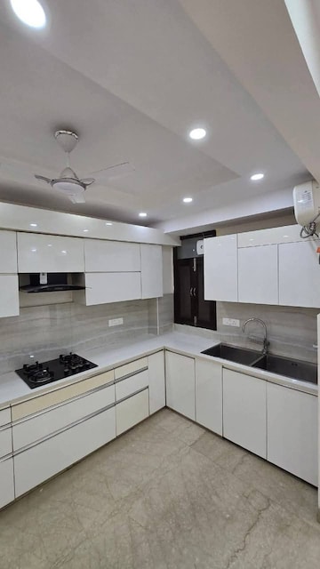 Kitchen in 4 BHK Apartment at Paras Quartier, Gwal Pahari – for Sale
