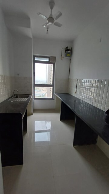 Kitchen in 2 BHK Apartment at Kalpataru Immensa, Kolshet Road – for Rent