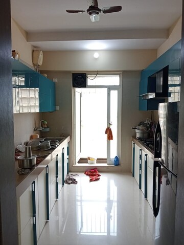 Kitchen in 2 BHK Apartment at Dosti Group Imperia, Manpada – for Rent