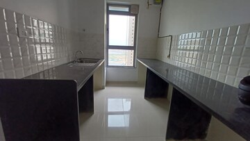 Kitchen in 2 BHK Apartment at Kalpataru Immensa, Kolshet Road – for Rent