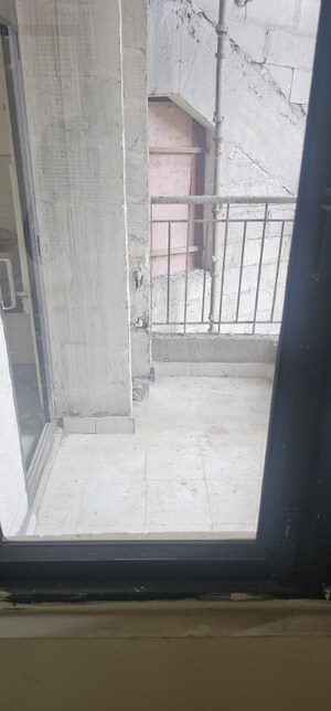 Building Lobby in 2 BHK Apartment at Charms Castle, Raj Nagar Extension – for Sale