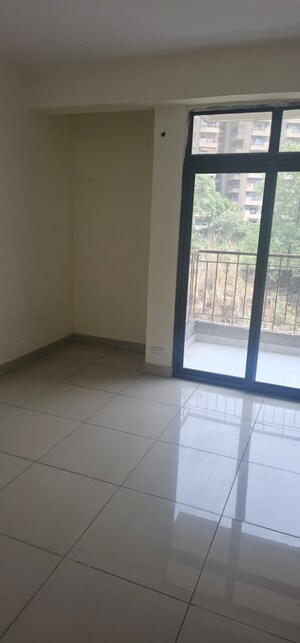 Room in 2 BHK Apartment at Charms Castle, Raj Nagar Extension – for Sale