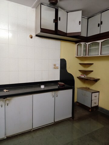Kitchen in 2.5 BHK Apartment at Siddhartha Darshan CHS, Naupada – for Rent