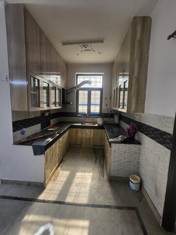 Kitchen in 3 BHK Builder Floor at Srishti Greenfield Homes, Green Fields Colony – for Sale