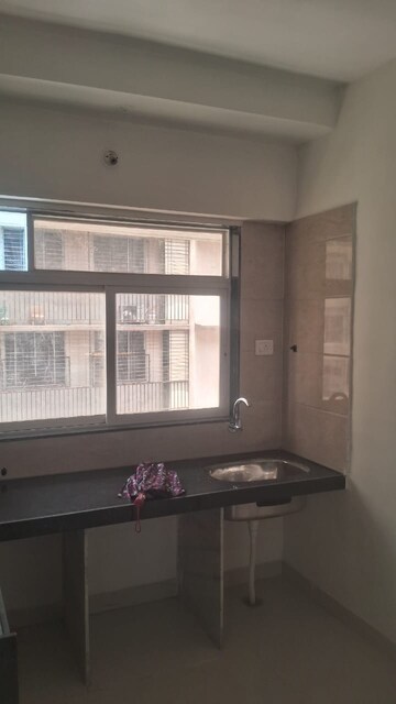 Kitchen in 1 BHK Apartment at Shree Krishna Daffodil Heights, Bhandup West – for Sale
