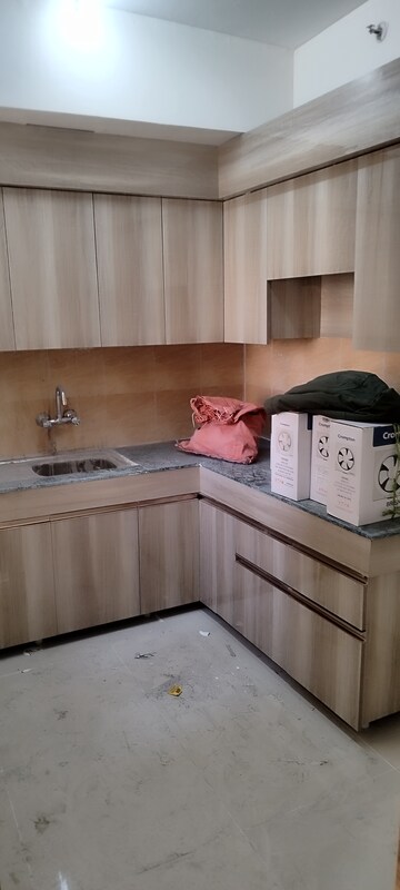 Kitchen in 2 BHK Apartment at Jaypee Greens Kosmos, Sector 134 – for Sale