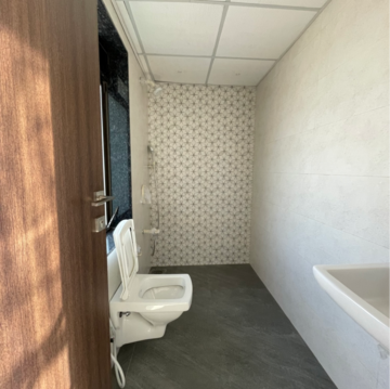 Bathroom in 1 BHK Apartment at Lalani Grandeur, Riddhi Gardens – for Rent